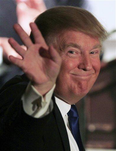  Possible 2016 presidential hopeful, Republican Donald Trump waves to a crowd of over 500 people as he is introduced during a luncheon with the Greater Nashua Chamber of Commerce, Wednesday, May 11, 2011 in Nashua, N.H. (AP Photo/Jim Cole)