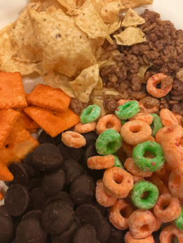 Pictured above is an assortment of junk foods including: chips, crackers, cereal, and chocolate. Junk or fast food is typically food with low nutritional value that is prepackaged and needs little preparation. (Broadcaster/Anna Levin) 