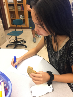 On Friday, October 7th, 2016. 
HHS Junior, Laney Herndon 
enjoys a snack from the session
while writing her letter to a veteran.
Herndon decided later to join
Key Club for the remainder of the
year. (Molly Glus/ Broadcaster) 
