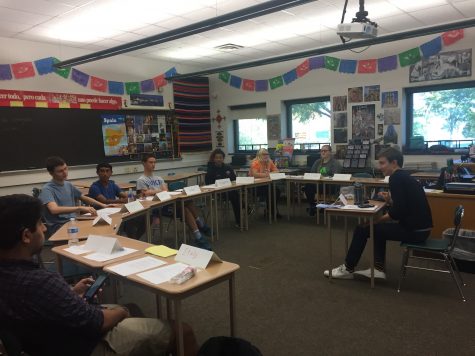 HHS students debate issues in Syria during Model UN’s Community Day session. The club members discussed the issue of whether or not countries should open their borders to refugees or not. (Broadcaster/Meredith Gould)