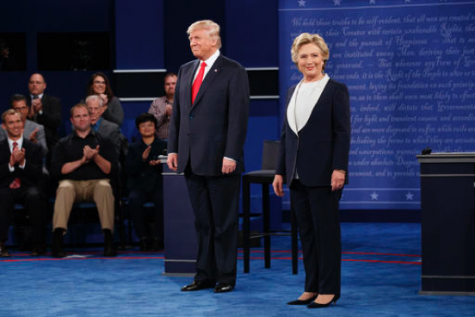 Republican presidential candidate Donald Trump, left, and Democratic presidential candidate Hillary Clinton arrive for the second presidential debate at Washington University, Sunday, Oct. 9, 2016, in St. Louis. (AP Photo/Evan Vucci)
