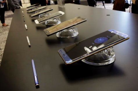 In this July 28, 2016, file photo, the Galaxy Note 7, foreground, is displayed in New York. U.S. regulators issued an official recall of Samsung's Galaxy Note 7 phone on Thursday, Sept. 15, 2016, because of a risk of fire. (AP Photo/Richard Drew, File)