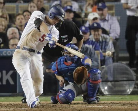 Corey Seager hits a single in the first inning of game 5 of the NLCS. The Dodgers would lose the series to the Cubs. (AP Images/Jae C. Hong)