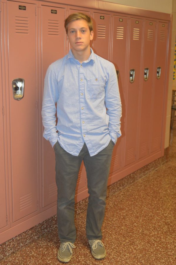 Chris Cronin, sophomore, dresses in a preppy fall outfit every day. Button up shirts, khaki pants, and Sperrys are his signature look for the fall season. (Elaina Joyner/ Broadcaster)