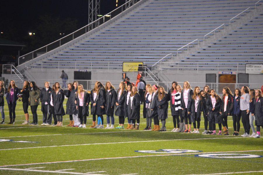 Prior to kickoff, Hershey girls tennis, field hockey, and cross country were honored for their successes this season. All three teams won both rounds of district play. (Broadcaster/ Alex Elchev) 