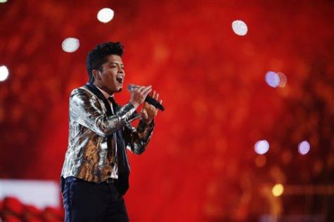 FILE - In this Feb. 2, 2014 file photo, Bruno Mars performs during the halftime show of the NFL Super Bowl XLVIII football game between the Seattle Seahawks and the Denver Broncos in East Rutherford, N.J. Mars Headlines the second night of the Rock in Rio USA festival which runs May 15-16, 2015, in Las Vegas. Other performers include John Legend, Big Sean and MAGIC! (AP Photo/Julio Cortez, File)