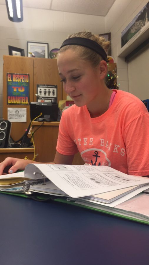 HHS freshman Alex Held studies biology for her upcoming unit test. Held, along with many other students, spend lots of time studying for quizzes and test this time of year. (Broadcaster/Elizabeth Newman) 