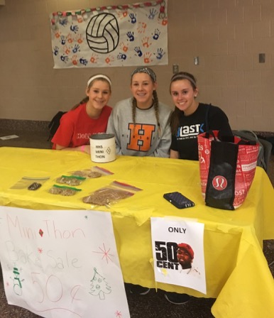 Sophomores Mayah Nicholson, Micah Nicholson, and Katie Cocco are selling backed goods for mini-THON during the volleyball tournament on December 22, 2016. The baked goods were 50 cents a piece. (Broadcaster/Kieri Karpa)