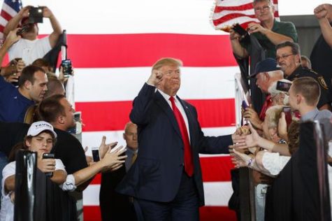 On October 12, Donald Trump arrives at a rally in Ocala, Fla. On the campaign trail, Trump made the uncommon move of releasing his list of potential supreme court nominees. (AP Photo/ Evan Vucci)