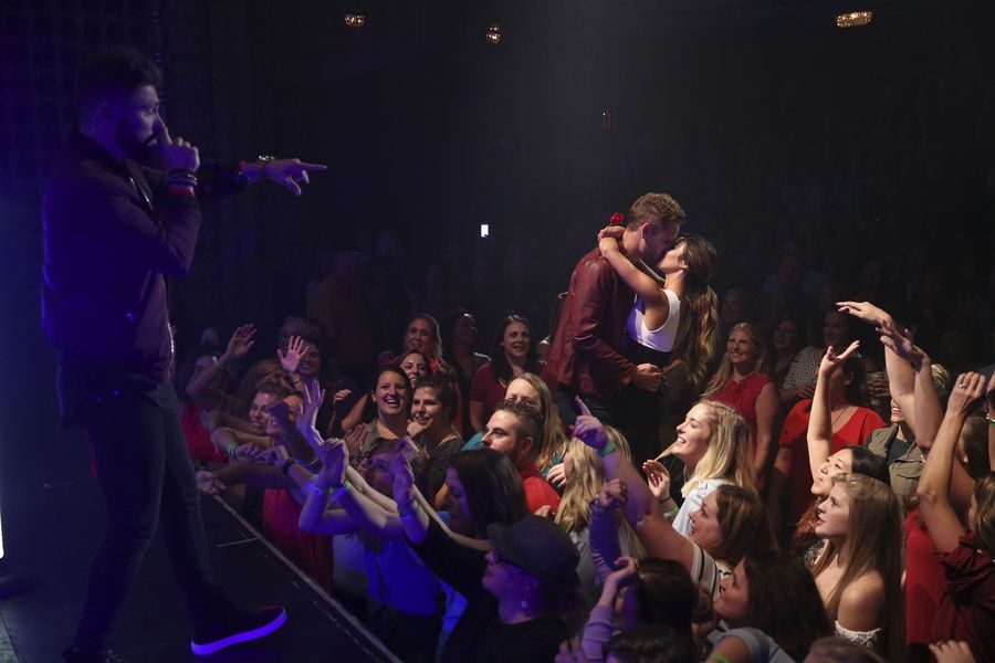 Singer/songwriter Chris Lane performs on the first one-on-one date in Milwaukee, Wisconsin. Nick gave Danielle L. the rose just before going out and dancing at the front of the crowd of people. (ABC/George Burns)