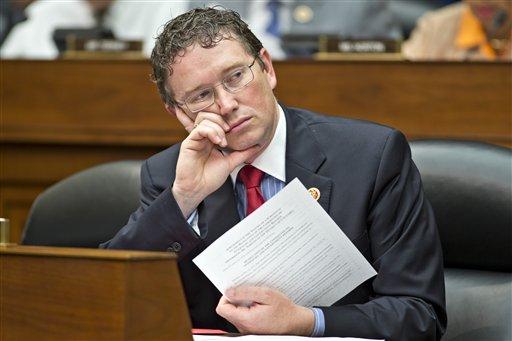 Representative Thomas Massie (R-TN) is pictured during a session of the House Oversight Committee in 2013.  Massie introduced a bill, H.R. 899, to abolish the federal Department of Education on February 7, 2017.