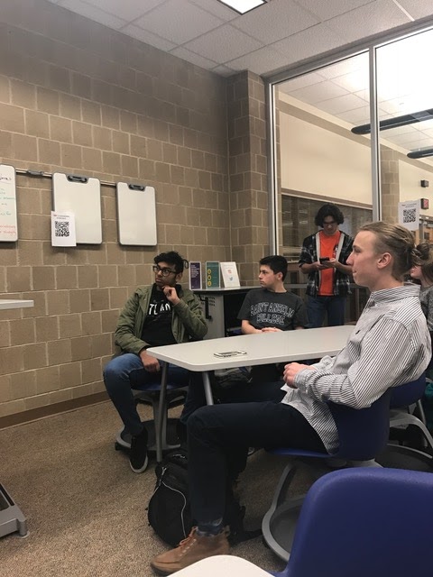 Senior Justin Walker (front right) sits at the TEDx meeting run by HHS junior Cameron Brown in Hershey High School on February 14th, 2017. Brown is looking for members to join him in building the Hershey community. (Broadcaster/Haley Daniels)