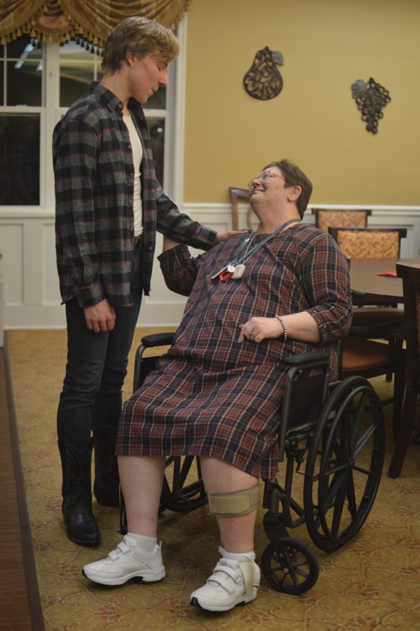 Kodiak Thompson says goodbye to a resident after the prom on March 9, 2017. Thompson performed for the residents before the dance started. 
