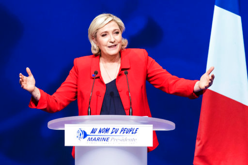 Far-right candidate for the presidential election Marine Le Pen speaks during a campaign meeting in Paris on April 17, 2017. They could hardly be more different: Pro-European centrist Emmanuel Macron is facing anti-immigration, anti-EU Marine Le Pen in France’s presidential runoff May 7. (AP Photo/Kamil Zihnioglu)