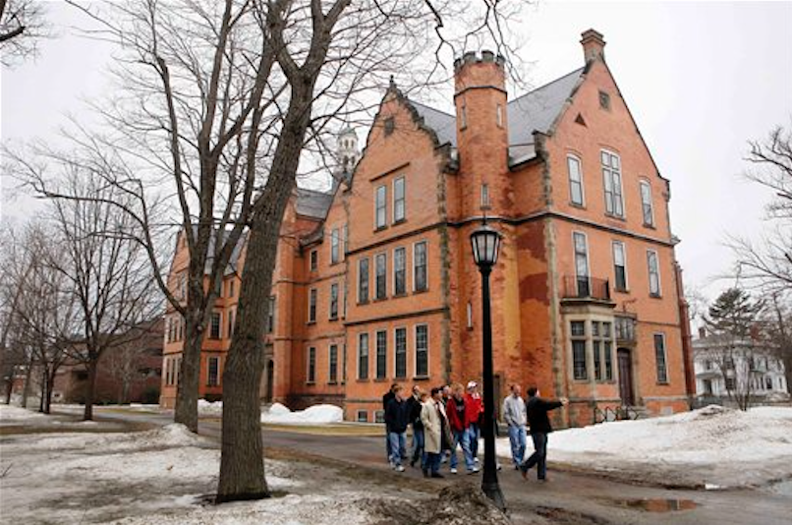 This March 19, 2009 file photo shows prospective students and their parents tour the campus of Bowdoin College in Brunswick, Maine. (AP Photo/Robert F. Bukaty, File)