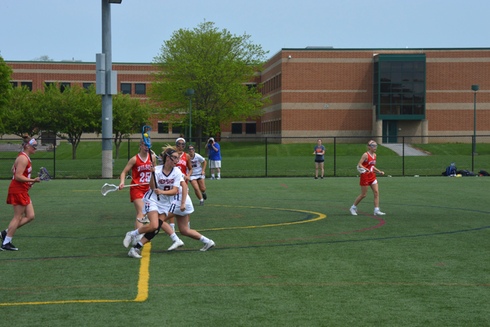 Hershey High School freshman Makenzie Stritzinger dodges Wilson defence. The game was held at Hershey’s home field on Saturday, April 29. (Broadcaster/ Emily Liesch)
