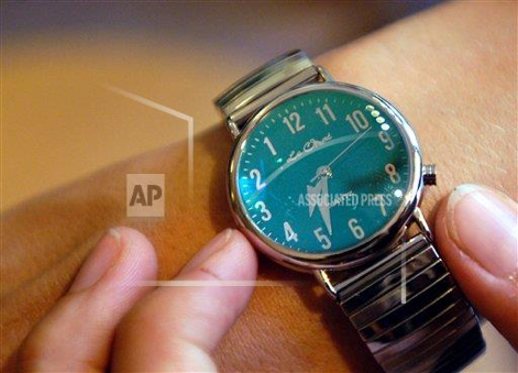 The hands of a woman present a left turning (counter clockwise) watch on her arm in Berlin, 11 August 2003. 13 August celebrates the International Left-handed Day which was first introduced by Dean R Campbell from the US in 1976. He had founded the Lefthanders International, which is the first worldwide association for left-handed people. 13 August 1976 was a Friday which was a deliberate choice by Campbell in order to remind that both, the infamous date and being left-handed, have been wrongly related to superstitious beliefs. (AP Photo/Michael Hanschke)