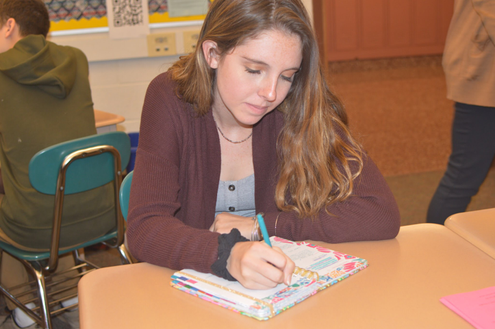 Like all Hershey High School students, sophomore Clare Canavan is no longer provided with a school planner; therefore, purchasing a personal planner is necessary to keep up with assignments and events. Lilly Pulitzer agendas are popular among Hershey High School girls because of their useful layout and bright designs. (Broadcaster/Olivia Bratton)