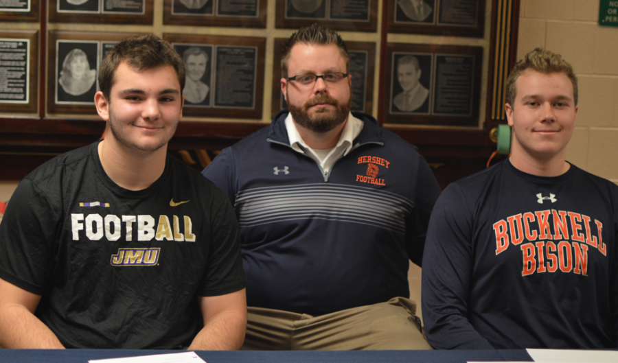 Drew Painter (left) and Daniel Sheehan (right) are pictured with Coach Frank Isenberg (center.) Both Painter and Sheehan signed on December 21, 2017. (Broadcaster/Anna Levin)