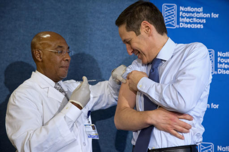 Nurse B.K. Morris, left, prepares to give the flu vaccine to Centers for Disease Control and Prevention Director Dr. Tom Frieden, during an event about the flu vaccine, at the National Press Club in Washington on Sept. 17, 2015. A flu shot each year can be a great way to decrease the odds of contracting the flu. (AP Photo/Jacquelyn Martin, File)