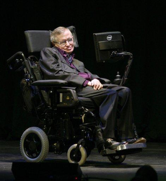 Physicist and best-selling author Stephen Hawking appears, Saturday, June 16, 2012, in Seattle. Hawking was taking part in the Seattle Science Festival Luminaries Series. (AP Photo/Ted S. Warren)