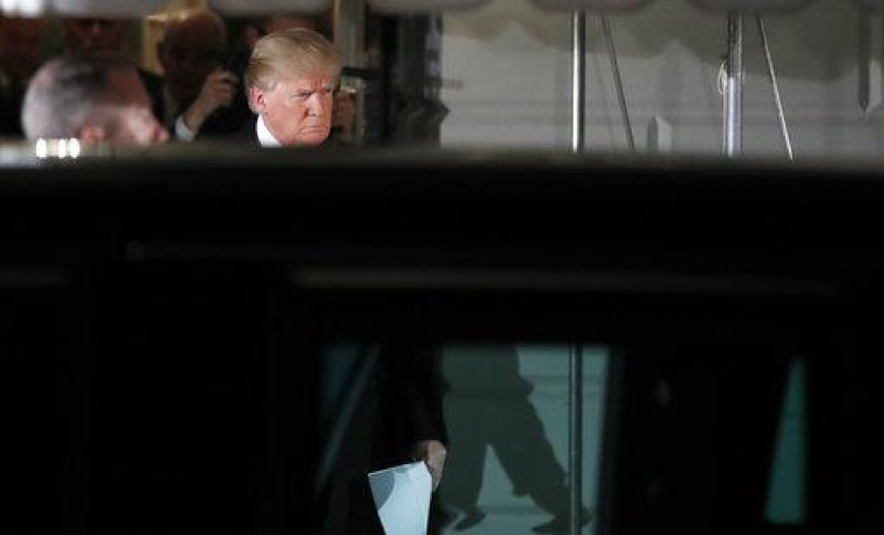 President Donald Trump walks to his limousine to depart the White House en route to the U.S. Capitol to give the State of the Union Address, Tuesday, Jan. 30, 2018, in Washington. (AP Photo/Alex Brandon)
