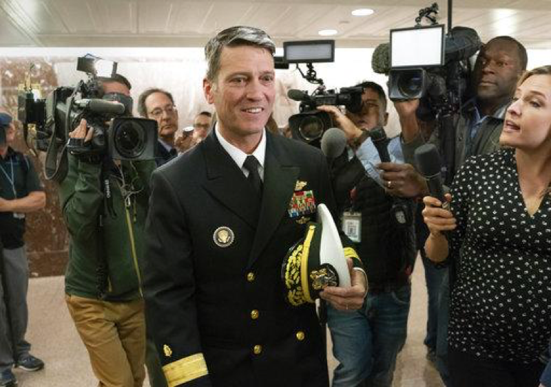 Ronny Jackson leaving a press conference on Wednesday explaining how the allegations stacked against him are “false and fabricated.” Jackson withdrew his nomination on Thursday amid growing pressure from administration. (AP Image/J. Scott Applewhite)