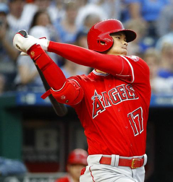 Shohei Ohtani hits a bases loaded triple against the Kansas City Royals. The Angels won the game 7-1. (Charlie Riedel/Associated Press)
