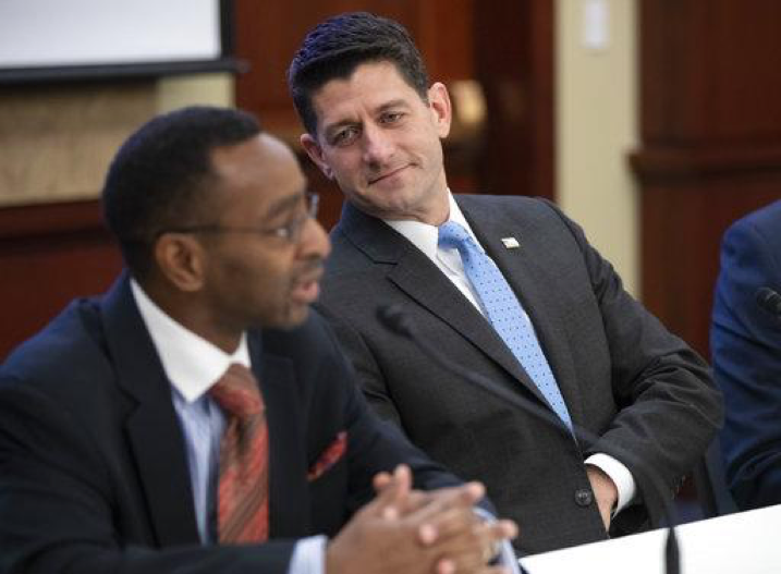 Speaker of the House Paul Ryan, R-Wis.,listens to Elroy Sailor, an executive focused on GOP outreach to the African American community. Ryan announced Wednesday April 11, 2018 he would not run for re-election this fall. (AP Photo/J. Scott Applewhite)