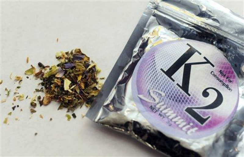 This Feb. 15, 2010, file photo shows a package of K2, a concoction of dried herbs sprayed with chemicals. Michigan Gov. Rick Snyder on Tuesday, June 19, 2012 signed bills banning so-called synthetic marijuana. The substance, sold under trade names like Spice and K2, has been available in stores as a mix of dried herbs and spices sprayed with chemicals. It has been blamed for health problems and violent behavior, especially among young people. (AP Photo/Kelley McCall, File)
