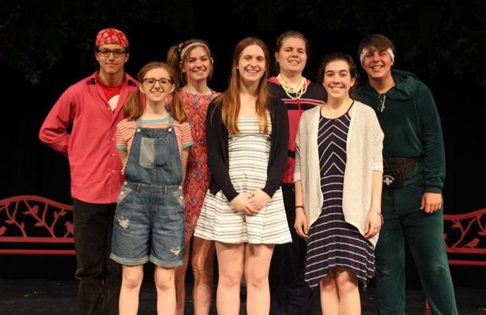 Taylor, front left, dressed as her character Lucy, poses with the rest of the Jigsaw Puddle cast. Tickets for “Jigsaw Puddle” cost five dollars for students and eight dollars for adults. (Tori Moss/Broadcaster)