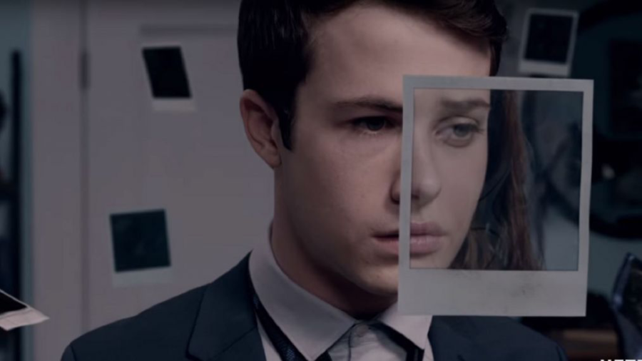Clay Jensen (Dylan Minnette), is partially covered by a Polaroid of Hannah Baker (Katherine Langford), in the season two teaser and release announcement for 13 Reasons Why. The teaser hinted at photos being the focus of season two’s drama (Netflix).