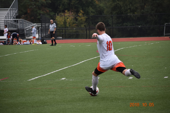 Number 10 on the field, King strikes a free kick near midfield. King says he excited for his soccer career to continue after high school. (Submitted by Heather King)