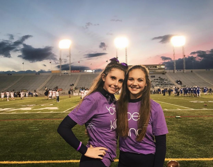 Clare Canavan on the sideline of the HHS football team at their annual “be kind” suicide prevention game along with her co-captain Kate Clark earlier this fall. (Caroline Glus/Broadcaster)