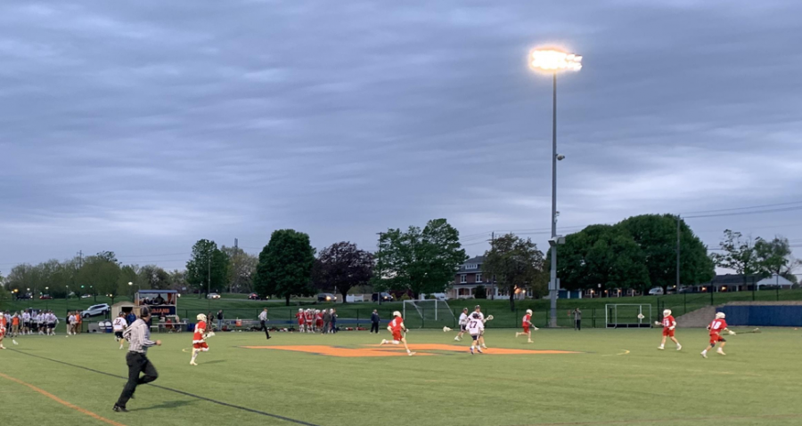 Hershey boys lacrosse off to a slow start during their game against Redland, running the ball up the field for another goal attempt. Hershey ended up with a huge win of 16-3. (Broadcaster/Caroline Diem)