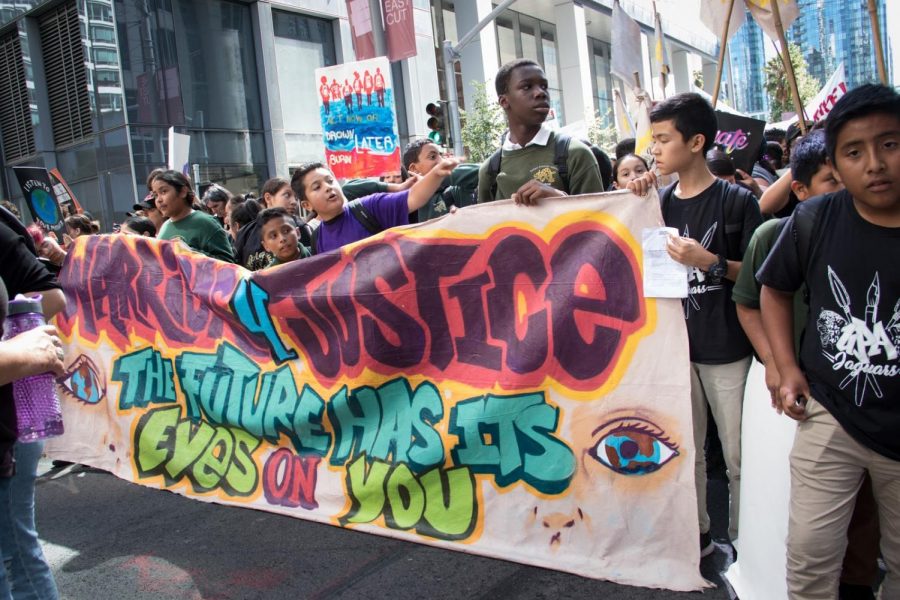 Thousands of students and adults from the San Francisco Bay Area march through the streets of San Francisco on September 20, 2019. Their message was targeted to banks and corporations that are funding the climate crisis. Peg Hunter/CC BY-NC 2.0) 