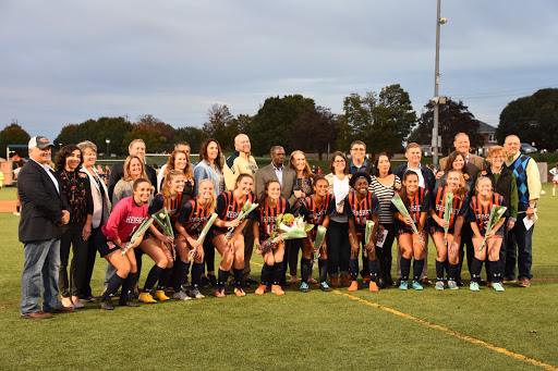 The Hershey High School Girls Soccer seniors pose for a picture with their parents after the Senior Night announcements. Senior Night was on October 7, 2019, vs. Palmyra Area High School. (Broadcaster/Kate Clark)