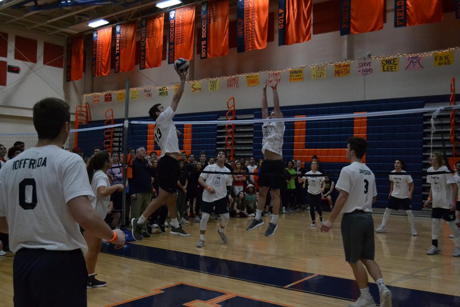 Evan King spikes past a defender during the Holiday Volleyball Tournament in 2018. The Broadcaster will be posting video and photo coverage throughout the tournament. (Photo/ The Broadcaster)