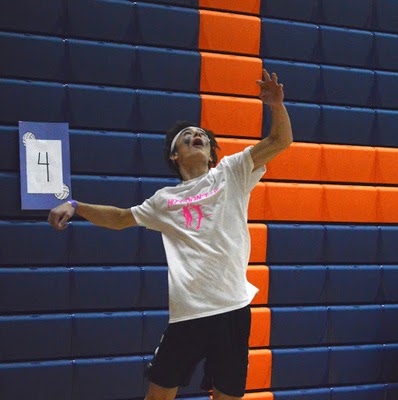 Luke Reid serves the ball during the 11 o’clock hour of the tournament. Students who participated in the volleyball tournament earlier payed an entry fee of five dollars which would go towards Mini-Thon and the Herren Project. (Broadcaster/Anna Callahan)