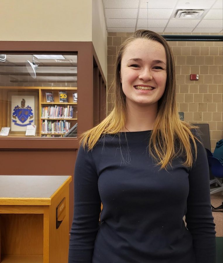 Anna Callahan poses in the HHS Library on Thursday January 30th. Her youth governor campaign is on instagram @callahan_4gov. (Broadcaster/Talon Smith)