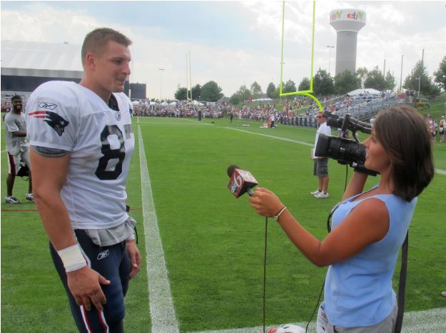 An ABC6 reporter interviews Rob Gronkowski during the 2011 season.  Gronkowski averaged 15.1 yards per catch and scored 79 touchdowns during his nine seasons with the New England Patriots.  (Bill Littlefield/Only A Game/CC BY-NC-ND 2.0)
