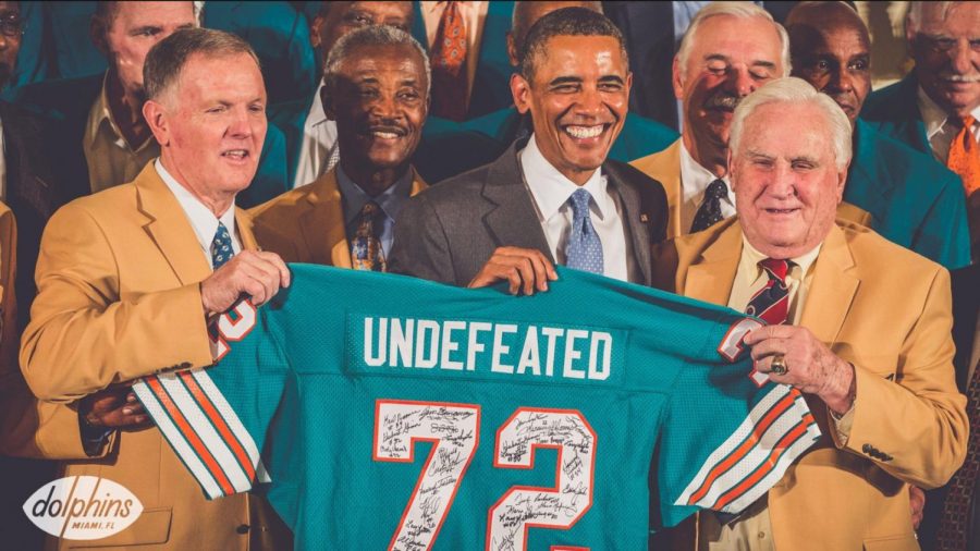 Don Shula’s 1972 undefeated Dolphins team visits president Barack Obama at the White House. Shula (pictured in the front right) coached the Dolphins for 26 seasons. (Miami Dolphins) 
