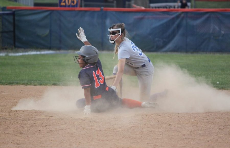 Center fielder, Adrianna Malena, slides to second base.  The umpire called her safe. (Broadcaster/Roma Orris)