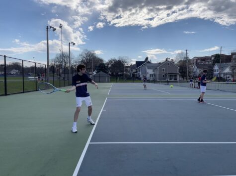 Hershey senior Matthew Carrera returns a serve from Fridays match against Cumberland Valley. Carrera and his partner, Monty Hanford, went on to achieve Hersheys one win that day. (Broadcaster/Maeve Reiter)