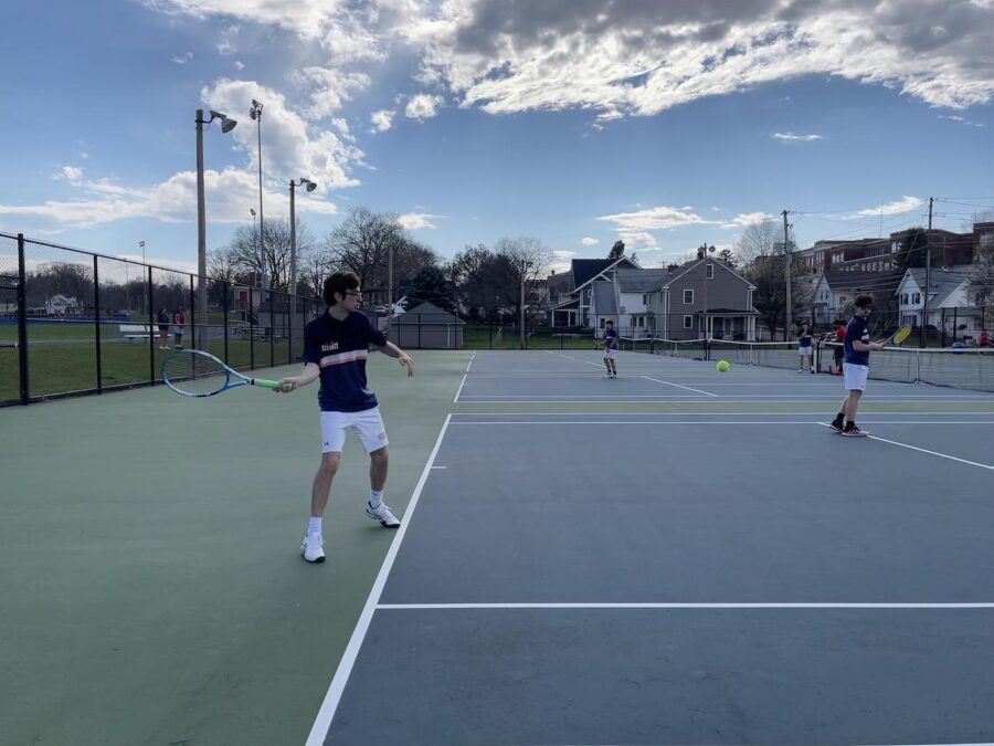 Hershey senior Matthew Carrera returns a serve from Friday's match against Cumberland Valley. Carrera and his partner, Monty Hanford, went on to achieve Hershey's one win that day. (Broadcaster/Maeve Reiter)