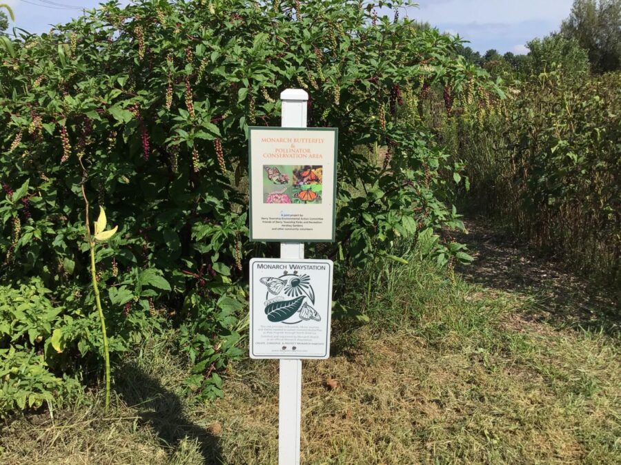 A+sign+with+photos+of+monarch+butterflies+is+posted+outside+of+the+Monarch+Butterfly+and+Pollinator+Conservation+Area+garden+in+Hershey.+The+garden+was+established+to+improve+pollination+from+monarch+butterflies+and+bees.+%28Broadcaster%2FAshley+Bu%29