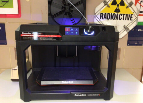 A 3-D MakerBot printer sits outside of the engineering classrooms. The printer can be used to create projects designed through computer-aided design. (HHS Broadcaster/Ashley Bu)
