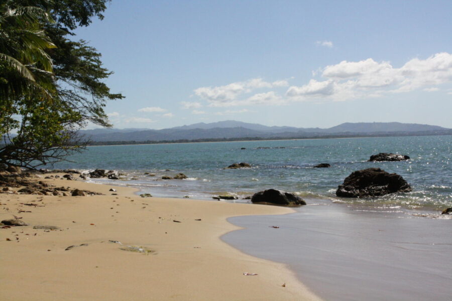 A deserted beach is pictured in Villa Orleans, Rincon, Puerto Rico.  Puerto Rico offers many sunny beaches and is a popular vacation destination.  (John McQuaid/CC BY-NC 2.0)