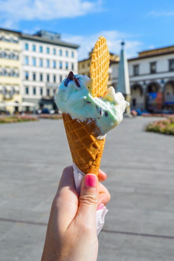 A person holds an ice cream.  What can be more quintessential than an ice cream on a hot summer day unless that day is July 1, National Creative Ice Cream Flavor Day.  (Gotta Be Worth It/Pexels) 