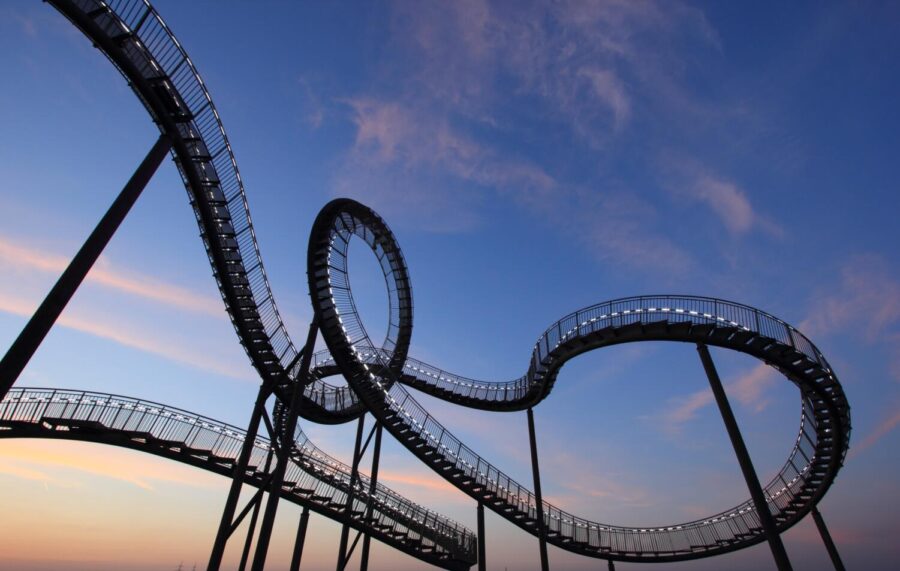 Pictured is a roller coaster at sunset.  NRCD is observed every year on August 16th because its believed that this date was when the very first vertical loop roller coaster was patented by Edwin Prescott back in 1898. (Pixabay)